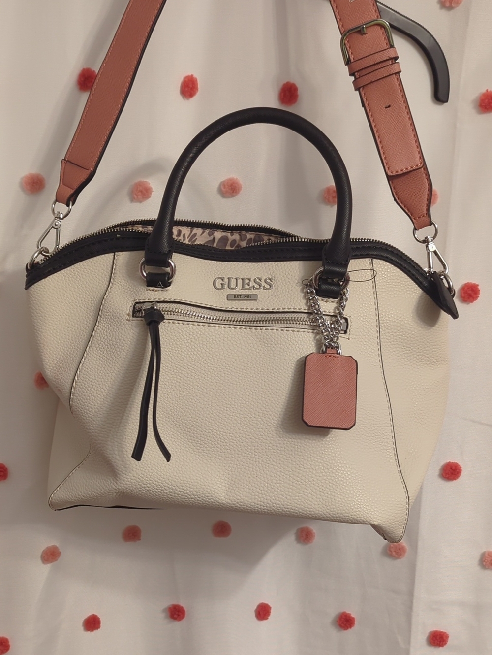 GUESS Cream Satchel with Black Handles and Pink Strap Accent